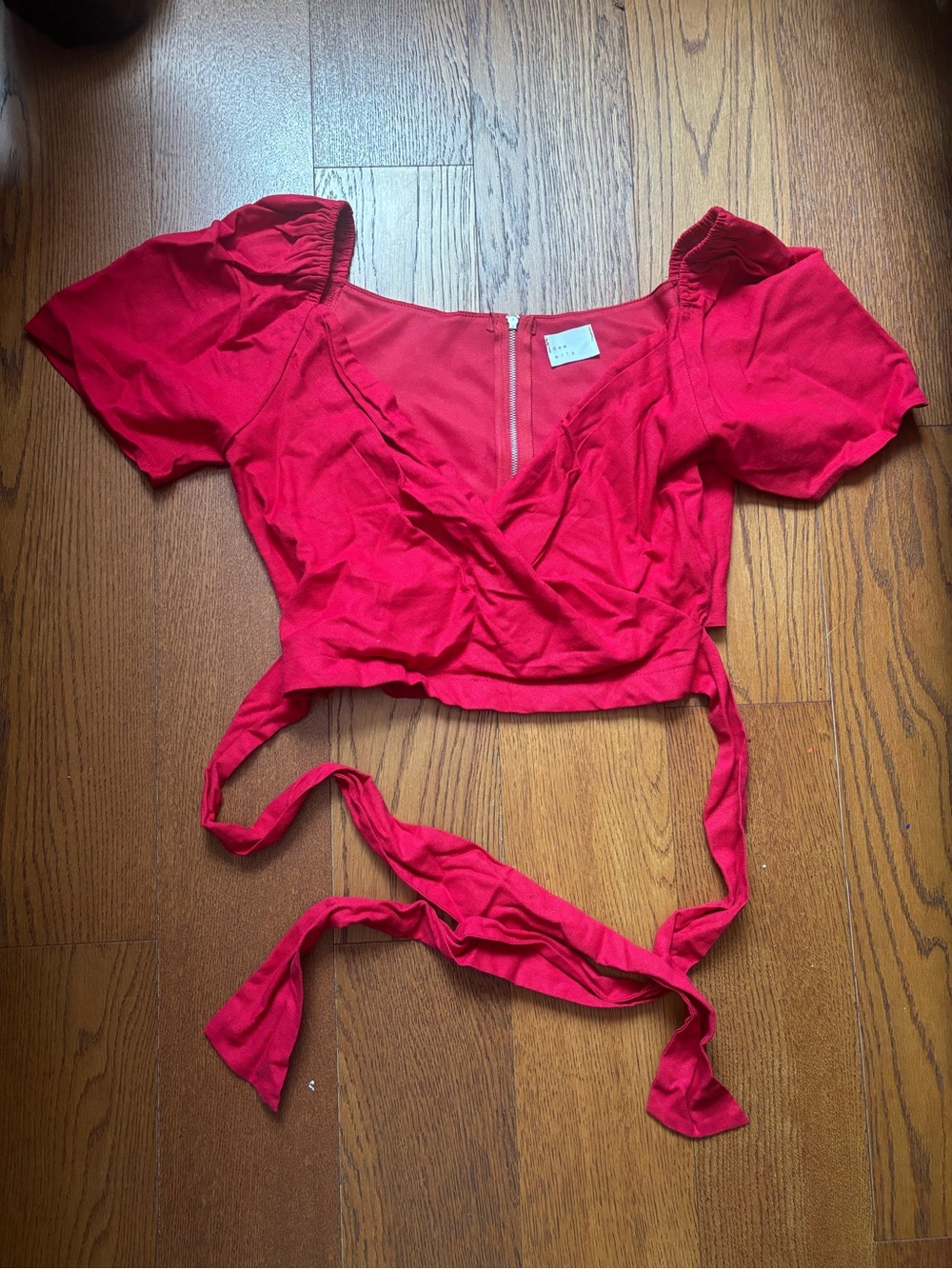 Red linen crop top with elegant bow tie back